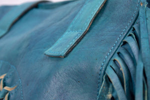 Bleu fringe leather bag