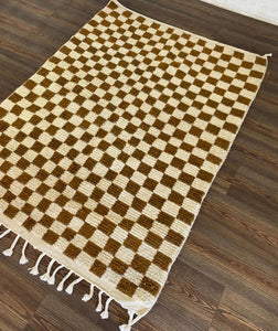 Light Brown and white area rug